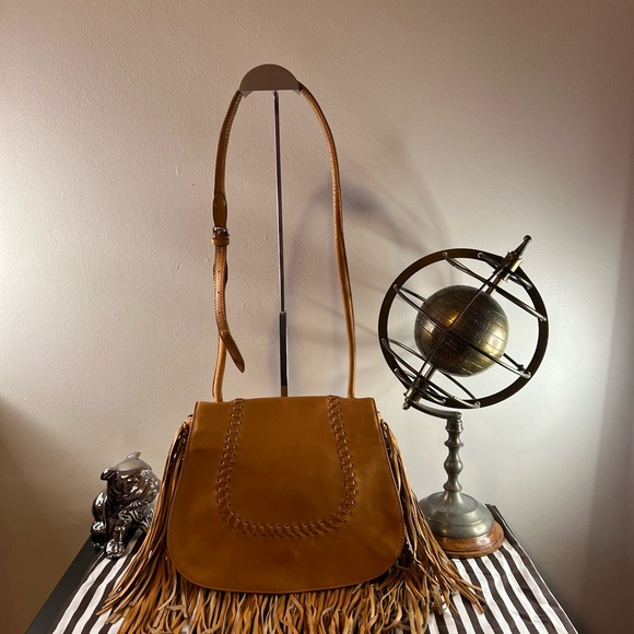 henri bendel Handbags - Henri Bendel tan leather fringe front flap crossbody purse